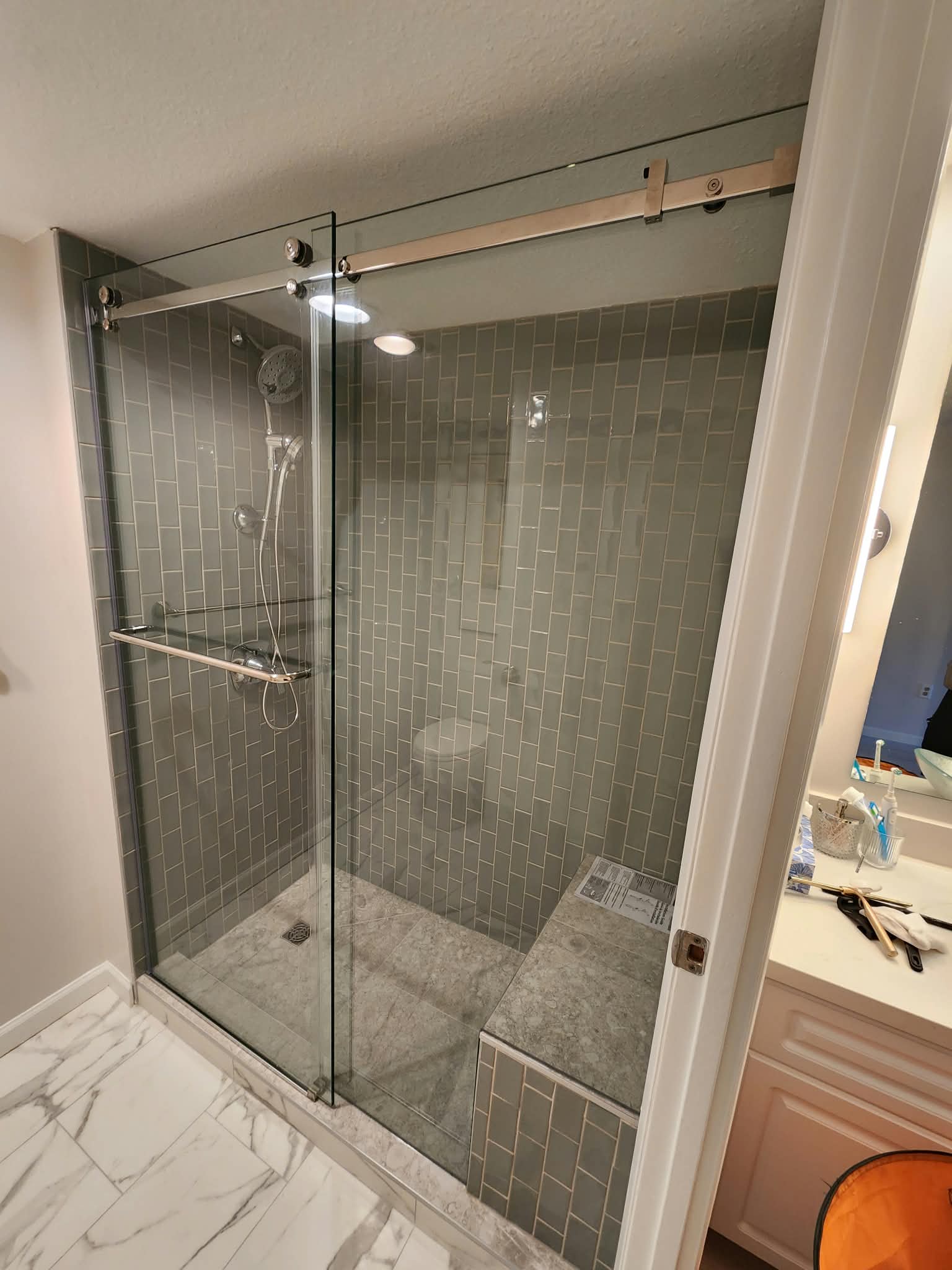 Ladner shower and washroom tile project, photo 2; shower glass enclosure installed by WaveGlass